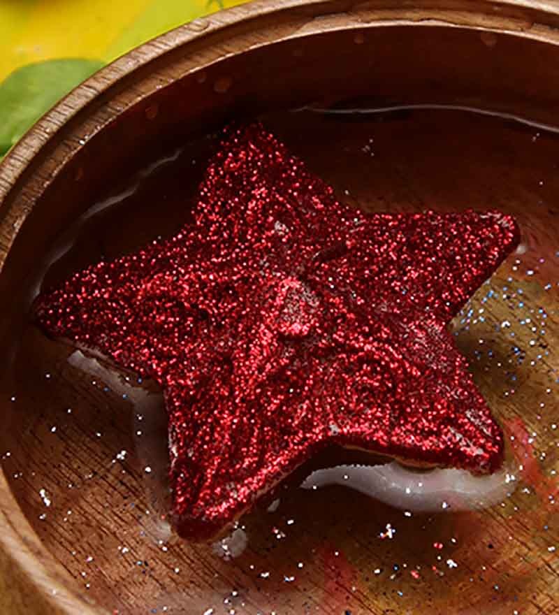Red Star Shaped Sparkle Floating Candle by Blackberry Overseas Online